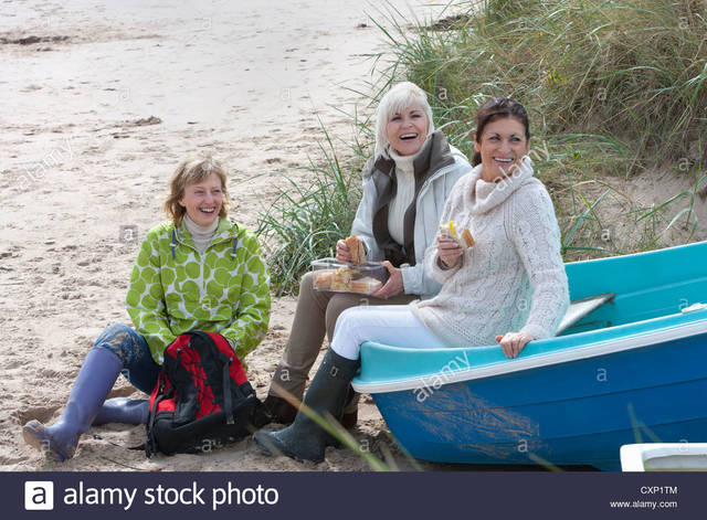 old mature women pictures photo old women enjoying mature group stock sitting boat picnic comp cxp