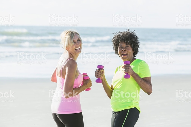 photo of mature women photo photos picture women mature beach exercising handweights