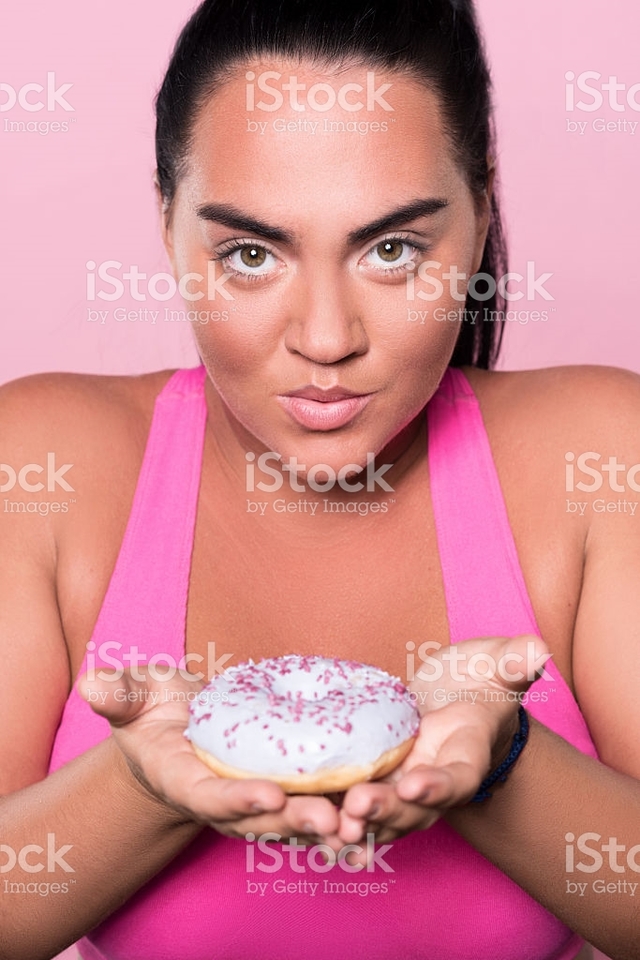 plump woman pics photo photos picture beautiful portrait woman plump tasty holding dessert