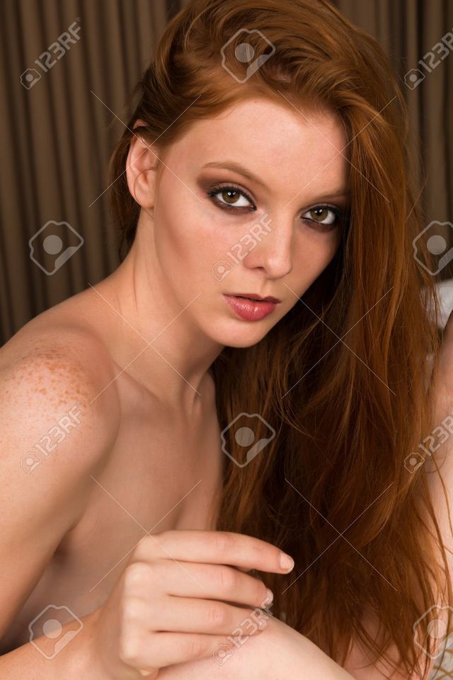 young nude redheads young photo redhead nude tall bed stock sitting disorderly