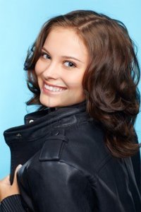 brunette woman pics sergeyp portrait beautiful young brunette woman black leather jacket blue photo