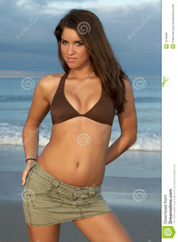 brunette woman pics young brunette woman brown bikini hands back pockets stock photography
