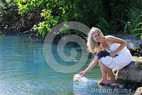 girl squirting photos girl squirting water lake royalty free stock