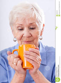 hot grandma pics grandma mug hot drink orange stock photo