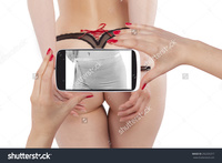 hot sexy ass stock photo beautiful woman hot sexy ass handcuffs seeing herself measuring waistline smartphone pic