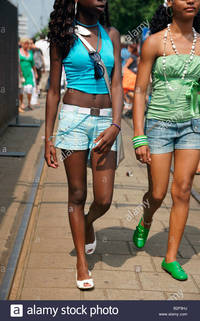 hot young black women comp pretty tan young black girls women walking street roterdam stock photo