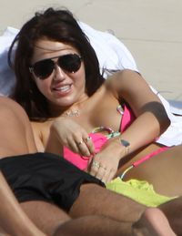 nipple porn gallery tkqkk miley cyrus nipple slip bikini