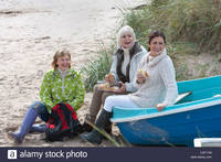 old mature women pictures comp cxp group mature women enjoying picnic sitting old boat stock photo