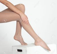 pantyhose nude pics falaterphotog woman legs wearing sheer nude pantyhose isolated against white studio background stock photo