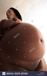 pic of naked black woman comp pregnant naked black woman stock photo