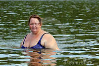 plump woman pics plump woman bath river stock photos