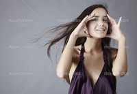 sexy brunette images depositphotos sexy brunette posing silk violet dress stock photo