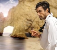 sexy exotic pic curaphotography sexy masculine man formal clothes smoking cigar exotic beach photo