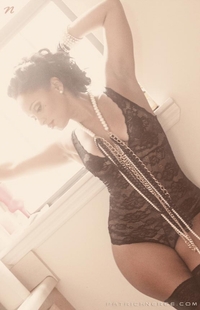 x pics lingerie photos tahiry jose leaning against counter modeling black lingerie white pearls shoot patrick neree